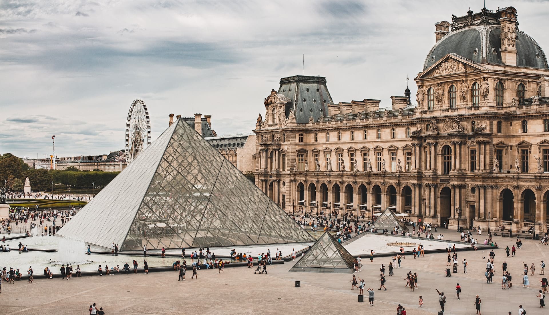 The Louvre's glass pyramid (photo: Mika Baumeister, Unsplash)